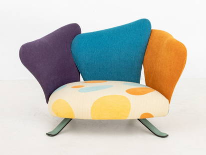 Giorgio Saporiti for Il Loft "Flower Baby" Chair: Giorgio Saporiti for Il Loft "Flower Baby" Chair, upholstered in blue and orange egg pattern fabric atop leather covered legs, marked to underside. 21" H x 26.75" W x 24" D; seat: 8.5" H. Provenance:
