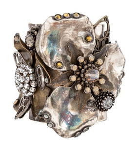 Miriam Haskell Gem-Set Silver Plate Floral Cuff: Miriam Haskell Gem-Set Silver Plate Floral Motif Cuff, mounted with marcasite and rhinestones, "Miriam Haskell" plaque to the interior. 3.5" H x 3.75" Diameter. Provenance: From a New York City Collec