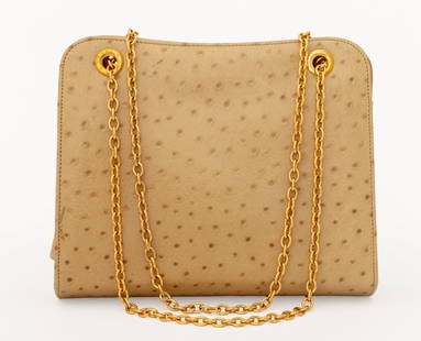 Fendi Tan Ostrich Leather Handbag: Fendi Tan Ostrich Leather Handbag, with chain strap, gold-tone hardware, two open compartments framing an interior snap closure marked "Fendi", within which is one zippered and one open side compartme