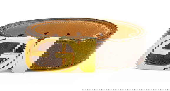 Gucci Gold-Tone Belt Buckle: Gucci Gold-Tone Belt Buckle, with brown leather strap, marked "Gucci - Italy" to the buckle. Overall: 38" L x 1.25" W. Provenance: From a New York City Collection. Keywords: Fashion, Accessories, Desi