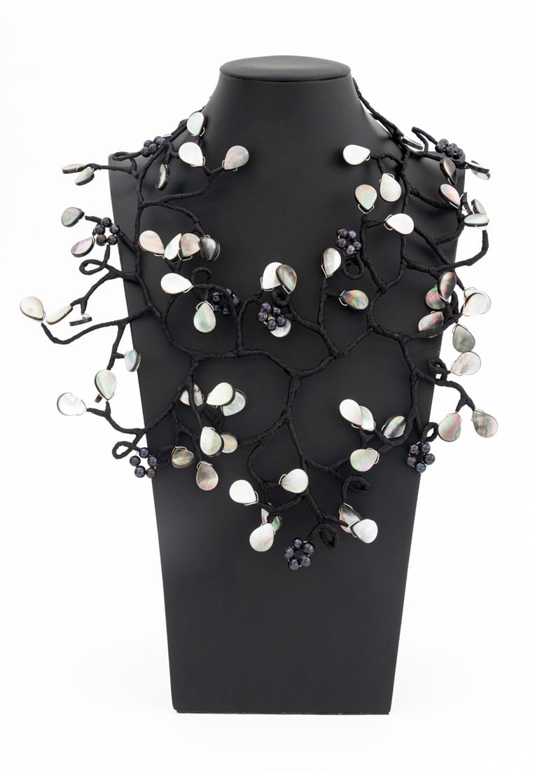 Vilaiwan Pearlized Petal & Black Pearl Necklace: Vilaiwan Pearlized Petal and Black Pearl Freeform Statement Necklace, comprised of black ribbon wrapped silver-tone pearlized black mother-of-pearl petals and beaded dyed black pearls. Petals measure