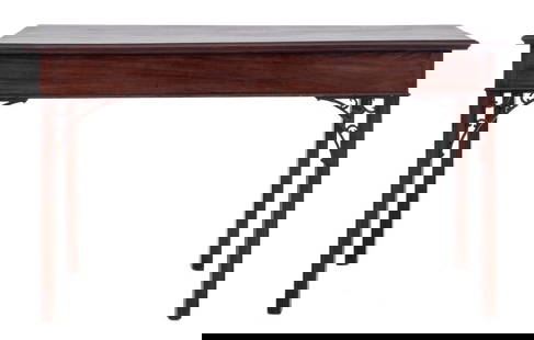 George III Chippendale Style Mahogany Console: George III Chippendale Style Mahogany Console, in the Chinese taste, elongated rectangular above an apron frieze, the square legs with reticulated brackets. 36" H x 62" W x 24" D. Provenance: From a N