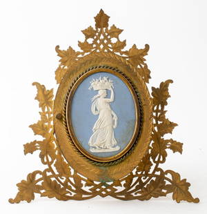 Victorian Wedgwood Mounted Gilt Metal Triple Frame: Victorian Wedgwood Mounted Gilt Metal Triple Frame, Howell, James & Co. of Regent Street, London, mounted with an old Wedgwood blue jasperware plaque after designs by John Flaxman (English, 1755-1826)