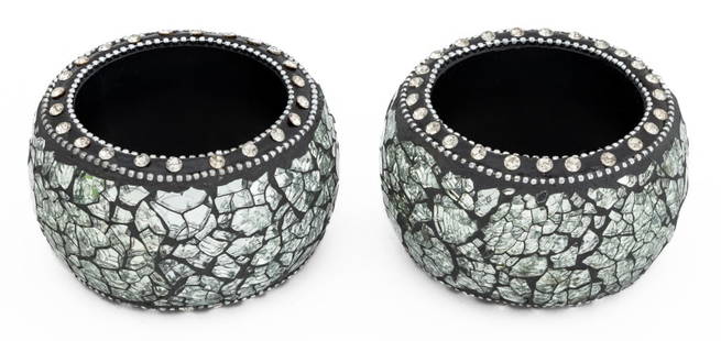 Contemporary Rhinestone Ebonized Wood Cuffs, 2: Pair of Contemporary Rhinestone Ebonized Wood Cuffs, with mosaic mirror motif and silver bead trim. Each: 3.5" Diameter x 2.25" W. Provenance: From a New York City Collection. Keywords: Fashion, Jewel