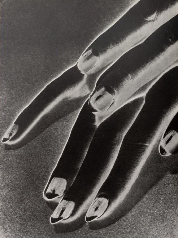 Man Ray "Solarized Hand" Photogravure: Man Ray (Emmanuel Radnitzky, American 1890-1976), "Solarized Hand", Photogravure, original 1930, printed later, unframed. 10.25" H x 7.75" W. Provenance: From a Fifth Avenue Collection. Keywords: Phot
