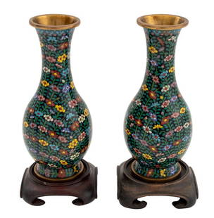 Chinese Cloisonne Floral Design Vases, Pair: Pair of Chinese Cloisonne Floral Design Vases, polychrome flowers and vines on black grounds, each on carved wood base. Vase: 8" H x 3.5" Diameter. Provenance: From an East 72nd Street Estate. Keyword