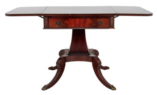 George III Style Flame Mahogany Pembroke Table: George III Style Flame Mahogany Pembroke Table, with two drop leaves, one drawer to front with brass handles, pedestal stem on arched legs ending in brass paw feet. 26.5" H x 49" W x 26" D. Provenance