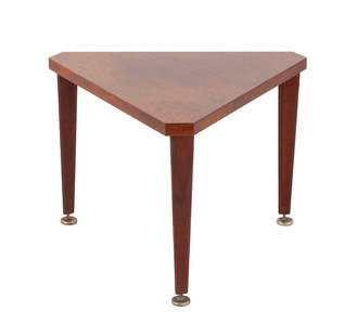 Mid-Century Modern Mahogany Triangular Side Table: Mid-Century Modern Mahogany Triangular Side Table, with three tapered legs above metal feet. 16.75" H x 23.75" W x 23.75" D. Provenance: From a 225 West 86th Street, New York City Estate. Keywords: Vi