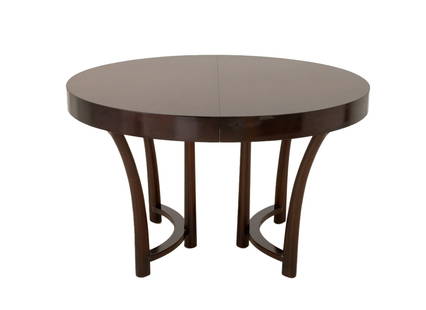 T.H. Robsjohn Gibbings Extendable Dining Table: T.H. Robsjohn Gibbings Extendable Walnut Dining Table, with three extension leaves. 28.75" H x 48" Diameter; fully extended: 83.75" W x 48" D. Provenance: From a Park Avenue Collection. Keywords: Desi