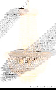 French Empire Style Crystal Basket Chandelier: French Empire Style Crystal and Gilt Metal Basket Chandelier, 20th century, top of tiers lined with small faceted beads, each dangling chains of larger faceted crystal beads. 28" H x 17" Diameter. Key