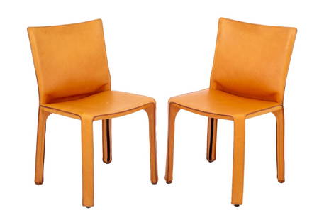 Mario Bellini for Cassina Leather Cab Chairs, Pair: Pair of Mario Bellini for Cassina Camel Brown Leather Cab Chairs, raised manufacturer's mark to undersides and Cassina labels. 32" H x 18.5" W x 16.5" W; seat: 18" H. Provenance: From a Vintage Collec