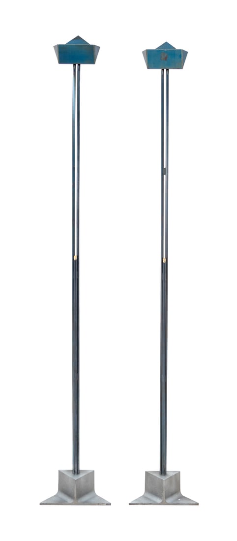 Manlio Brusatin for Sirrah "Eidos" Floor Lamps, 2: Pair of Manlio Brusatin for Sirrah "Eidos" Floor Lamps, 1980s, with iridescent deep blue patinated shade and double tubular steel supports on triangular steel base. 80" H x 12" W x 4.5" D. Provenance:
