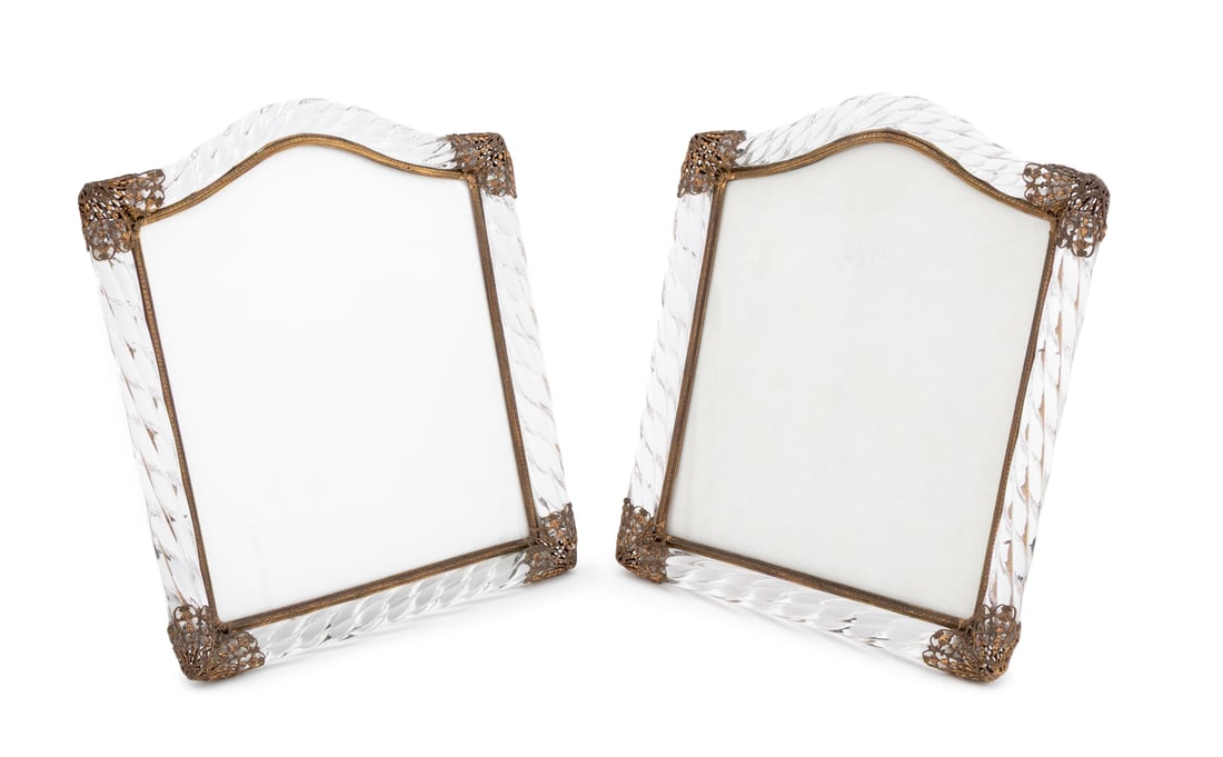 Murano Brass Mounted Twisted Glass Frames, Pair: Pair of Murano Brass Filigree Mounted Twisted Glass Picture Frames, mid 20th century. 11.5" H x 9.75" W x 4" D. Provenance: The Upper East Side Estate of Anne Kaufman Schneider, the daughter of Pulitz
