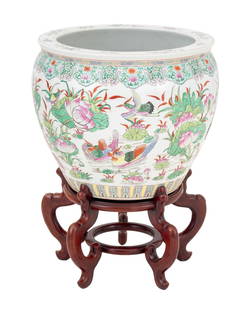 Chinese Famille Rose Porcelain Fish Bowl: Chinese Famille Rose Porcelain Fish Bowl, on a hardwood stand, with red six character mark to underside. Overall: 29" H x 21" Diameter. Provenance: From an East 81st Street New York City Estate. Keywo