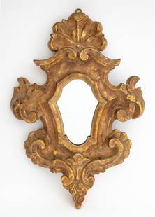 Italian Rococo Style Giltwood Wall Mirror, 18th C.: Italian Rococo Style Giltwood Wall Mirror, 18th century, with scrolled foliate design. 20" H x 13.5" W. Provenance: From a New York City Collection. Keywords: Looking Glass, Hanging mirror, Vanity, Wa