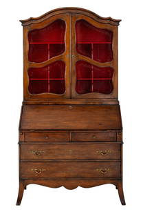 French Provincial Walnut Bureau Bookcase: French Provincial Walnut Bureau Bookcase, 19th century, the top two door cabinet with seven open shelves painted red and two pull-out writing surfaces above fall front desk opening to six drawers and