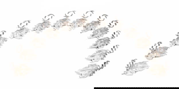 Christian Dior Silver Plate Place Card Holders, 12: Set of 12 Christian Dior Silver Plate Leaf Form Name Card Holders, marked "Christian Dior" to the underside. 0.75" H x 1" W x 1.5" D. Provenance: From a Greenwich, Connecticut Collection. Keywords: Vi