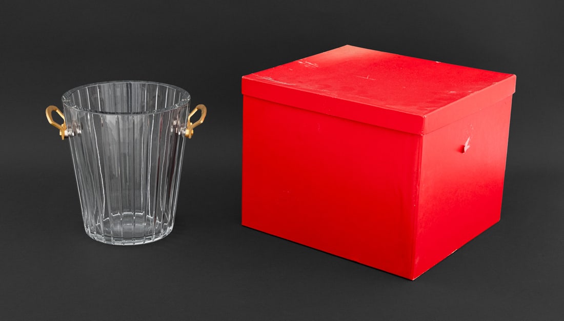 Baccarat Crystal "Harmonie" Ice Bucket: Baccarat Crystal "Harmonie" Ice Bucket, fluted sides with gilt metal handles, Baccarat mark to underside, with original red box. 9" H x 10" W x 8" D; box: 10.25" H x 13.25" W x 12.5" D. Provenance: Fr