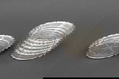 Webster & Co. Sterling Mounted Glass Coasters, 7: Set of Seven Webster and Company Fluted Sterling Silver Mounted Star Cut Glass Coasters, each marked on the reverse. 3.25" Diameter. Provenance: From an Upper East Side Townhouse. Keywords: Designer,