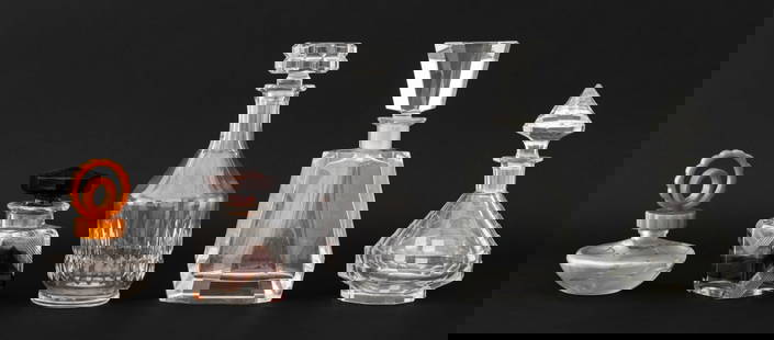 Art Deco Cut Glass Articles, 5: Collection of Five Art Deco Cut Glass Articles, comprising: (3) three clear glass decanters and (2) perfume bottles, one with butterscotch Bakelite stopper and one with amber colored stopper and geome