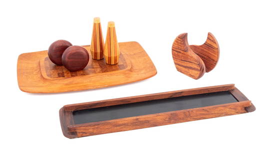 Danish Modern Hardwood Tableware Articles, 7: Collection of Seven Hardwood Tableware Articles, comprising: Dansk parquetry platter, a rosewood tray, two pairs of salt and pepper shakers, and a napkin holder. Platter: 18.25" L x 12" W x 1.5" D. Pr