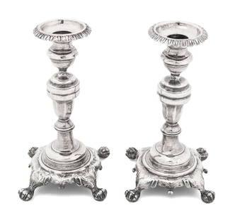 French Silver Plate Candlesticks, Pair: Pair of French Silver Plate Candlesticks, with scalloped rim on shaped base with four claw and ball feet, marked to the base. 7.5" H x 4" W x 4" D. Provenance: From a Greenwich, Connecticut Collection