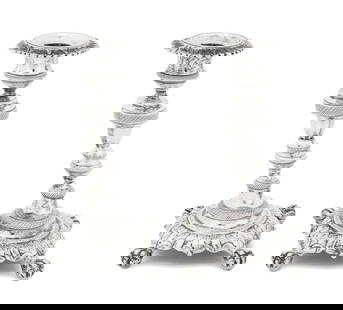 French Silver Plate Candlesticks, Pair: Pair of French Silver Plate Candlesticks, with scalloped rim on shaped base with four claw and ball feet, marked to the base. 6" H x 3: W x 3" D. Provenance: From a Greenwich, Connecticut Collection.