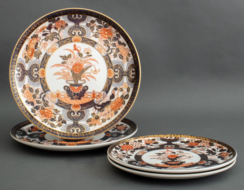 Japanese Imari Porcelain Plates, 4: Set of Four Japanese Imari Porcelain Plates, with floral vase motif to center medallion, comprising: two dinner plates and two chargers. Larger: 12.5" Diameter. Provenance: From a Central Park West Co