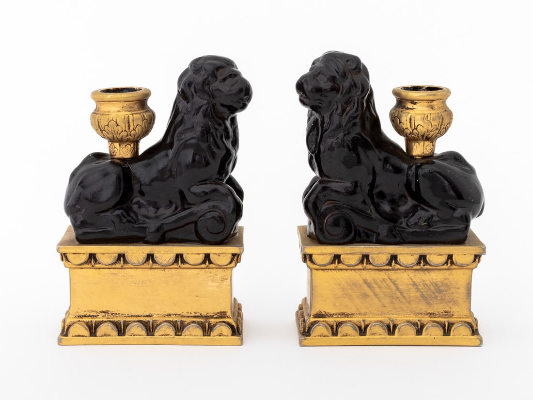Louis XVI Style Lion Motif Candlesticks, Pair: Pair of Louis XVI Style Reclining Lion Motif Patinated Spelter Candlesticks, mounted on gilt painted rectangular bases. 6" H x 3.75" W x 2" D. Provenance: From a 140 East 56th Street Estate. Keywords: