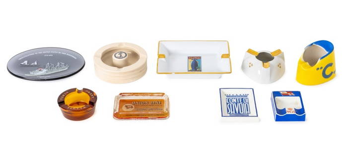 Ceramic and Glass Nautical Motif Ashtrays: Collection of Nine Ceramic and Glass Nautical Motif Ashtrays, comprising: Richard Ginori "Conte di Savoia", marked to the underside, amber glass "Flotta Lauro Lines", Royal Doulton O.S.N. & Co with na