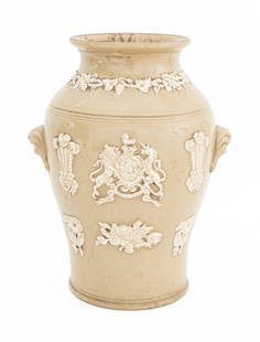 British Salt Glazed Stoneware Urn: British Salt Glazed Stoneware Urn, with two handles, embossed grapevine to the neck and United Kingdom coat of arms with floral bouquets. 15.75" H x 10.25" Diameter. Provenance: The Upper East Side Es