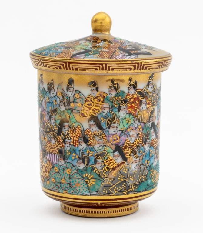 Japanese Kutani Porcelain Covered Teacup: Japanese Kutani Ware Porcelain Covered Tea Cup, with elaborate figural scene and gilt decoration, interior with hand-painted writing, maker's mark to underside. Overall: 3.5" H x 2.75" Diameter. Prove