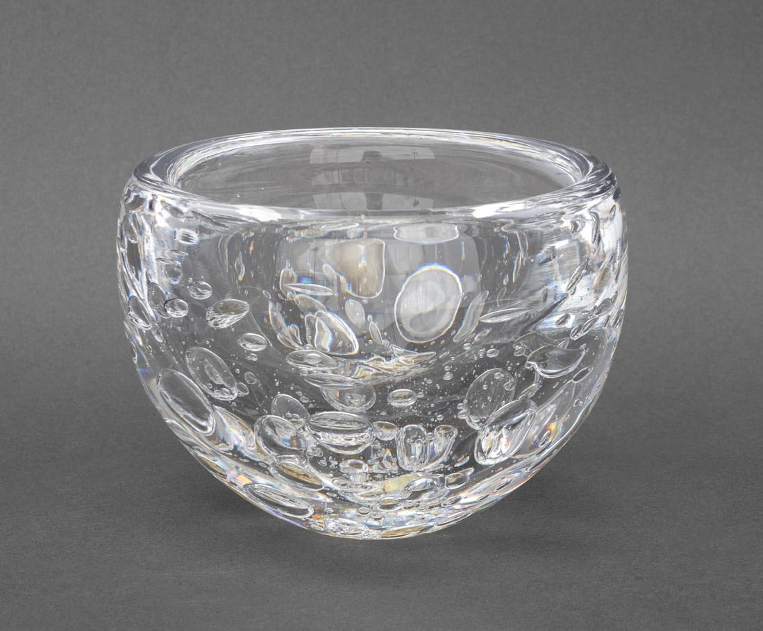 Swedish Decorative Glass Bowl: Swedish Decorative Glass Bowl, 1960s, produced by Kosta, in heavy hand-blown glass, clear with controlled bubbles, a few in tones of amber, marked "Kosta Unik" etched to the base. 5" H x 6 Diameter. P