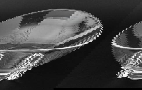 Steuben Basket Shaped Crystal Center Bowl: Steuben Basket Shaped Crystal Centerpiece Bowl, marked "Steuben" to underside. 5.25" H x 11.5" W x 9.5" D. Provenance: From a New York City Collection. Keywords: Art Glass, Glassware, Glasswork, Desig