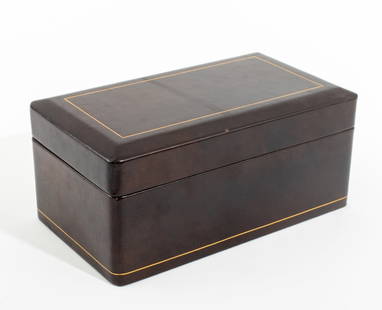 Smokador Leather Humidor: Smokador Leather Humidor Box, embossed geometric design, label to underside, 4" H x 9" W x 5.25" D. Provenance: From a New York City Collection. Keywords: Smoking accessories, Storage, Container, Wood