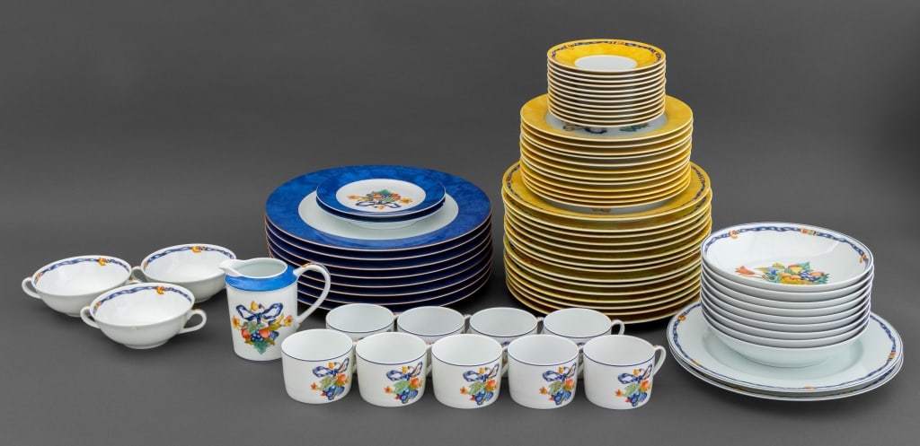 Limoges Bernardaud Porcelain Service, 39 Pcs.: Limoges Bernardaud Porcelain Partial Dinner Service, in the "Borghese" pattern, in yellow and nuage bleu, comprising: (8) eight chargers, (15) fifteen dinner plates, (14) fourteen salad plates, and (1