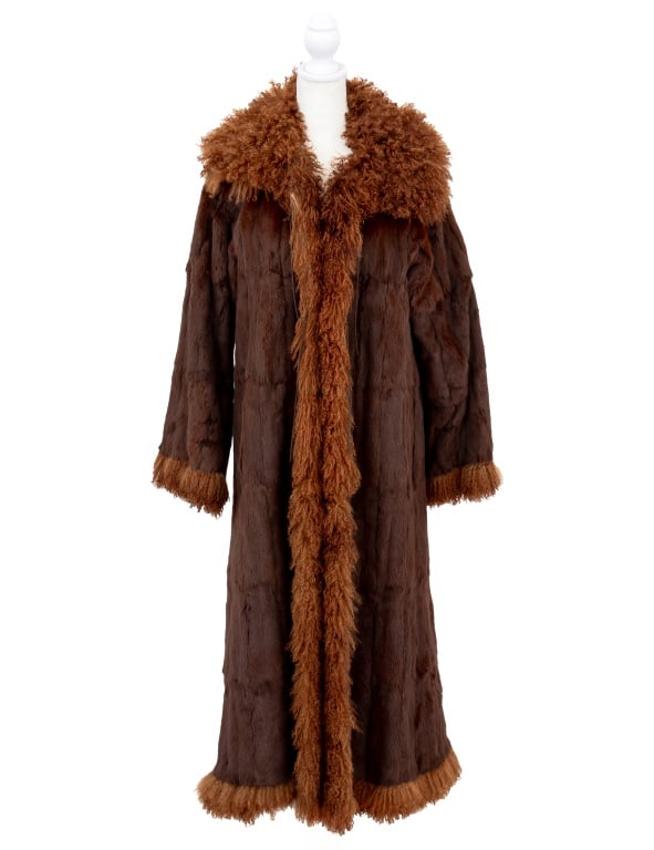 Fendi Full-Length Fur Coat: Fendi Full-Length Fur Coat, with coarse fur trim and collar, brown Fendi logo silk lining and "Fendi" label to the back panel. Overall length: 50"; Shoulders: 16"; Bust: 35"; Sleeve length: 23". Prove