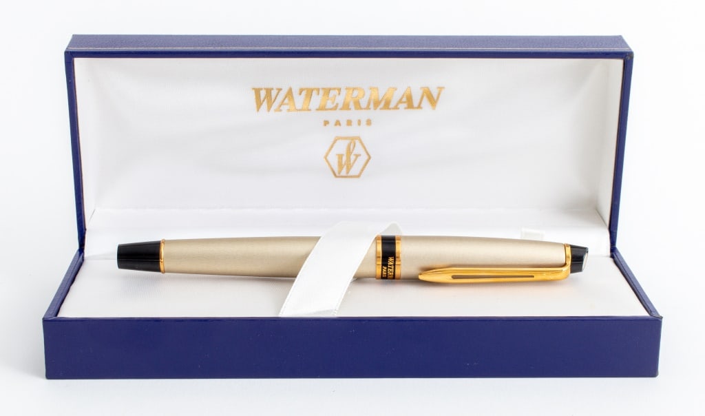 Waterman Paris Fountain Pen: Waterman Paris Fountain Pen, nib size M, matte chrome metal body with gilded and black lacquer applications, made in France. 5.5" H x 0.5" Diameter. Provenance: From a New York City Collection. Keywor