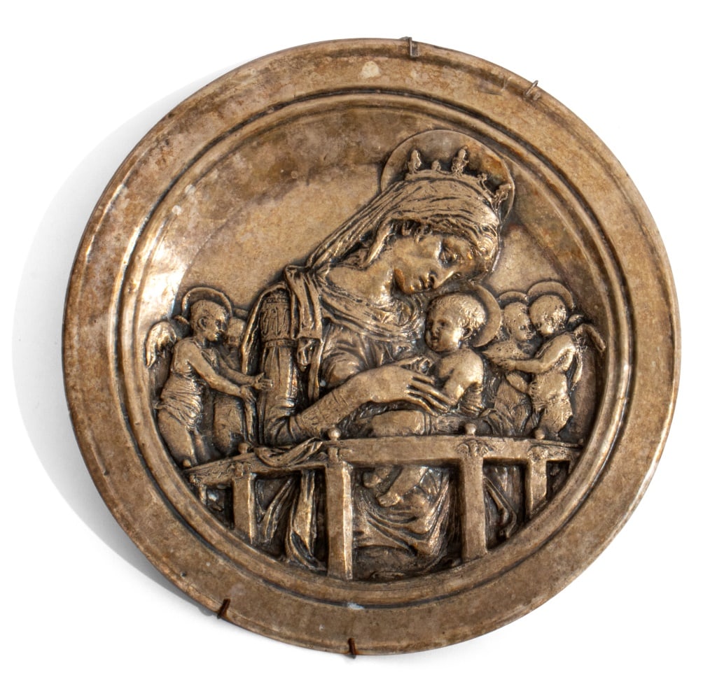 After Donatello "Madonna" Silver Plate Roundel: After Donatello "Chellini Madonna" Silver Plate and Silver Filled Roundel, 1976, struck with marks for "Pobjoy Mint Ltd", numbered edition "561-750" to underside. 11" Diameter. Provenance: From an Upp