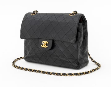 Chanel Quilted Black Leather Double Flap Bag