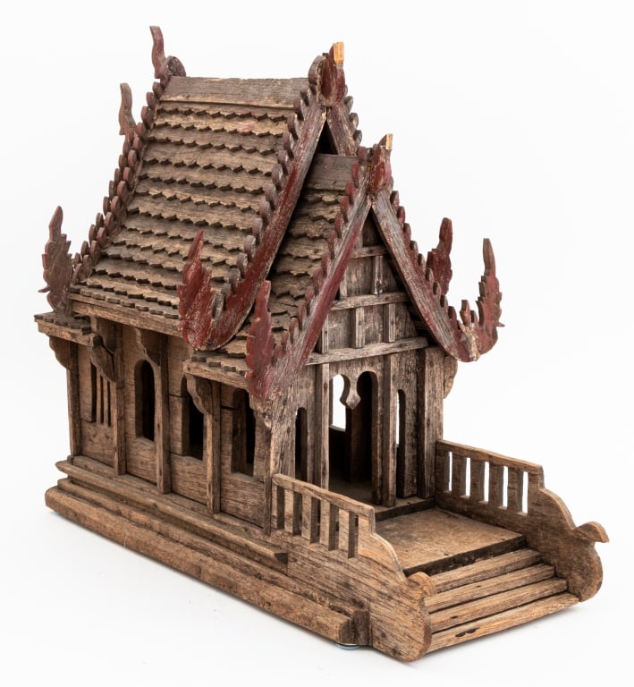 Thai Carved Wood Spirit House: Thai Carved Wood Spirit House, 20th century, with painted red flamed roof and stepped entry. 15.75" H x 18.5" W x 8.25" D. Provenance: From a 60 East End Avenue Estate. Keywords: Folk Art, Thailand, W