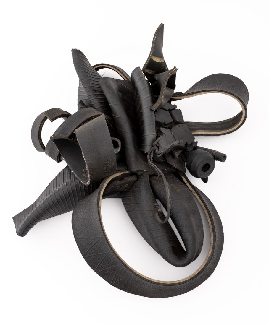 Chakaia Booker "Duty Free", 2010: Chakaia Booker (American, b. 1953) "Duty Free", 2010, rubber tire assemblage sculpture, signed and dated on back, with two signed wooden cleats. 24" H x 24" W x 9" D. Provenance: Museum of Arts and De