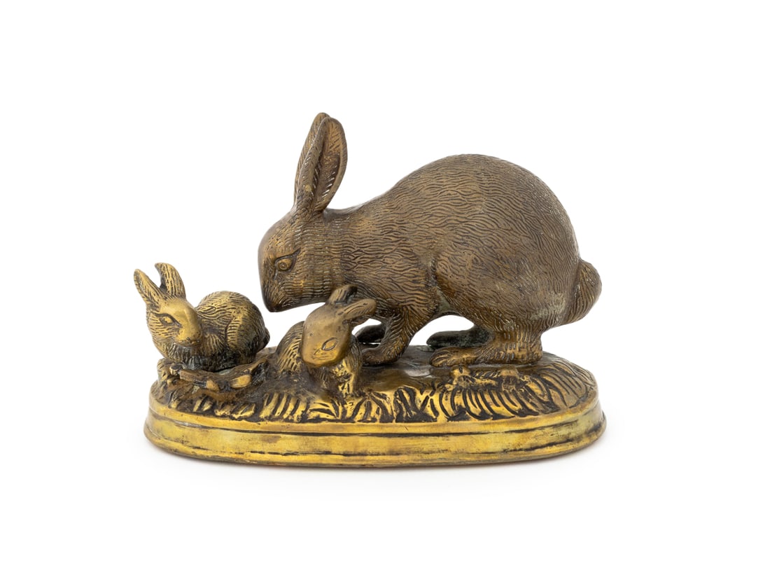 Rabbit Family Gilt Metal Sculpture: Rabbit Family Gilt Metal Sculpture, the mother and two baby bunnies atop an ovoid grassy base. 4.25" H x 6.5" W x 3.5" D. Provenance: From a New York City Collection. Keywords: Statue, Metalwork, Figu