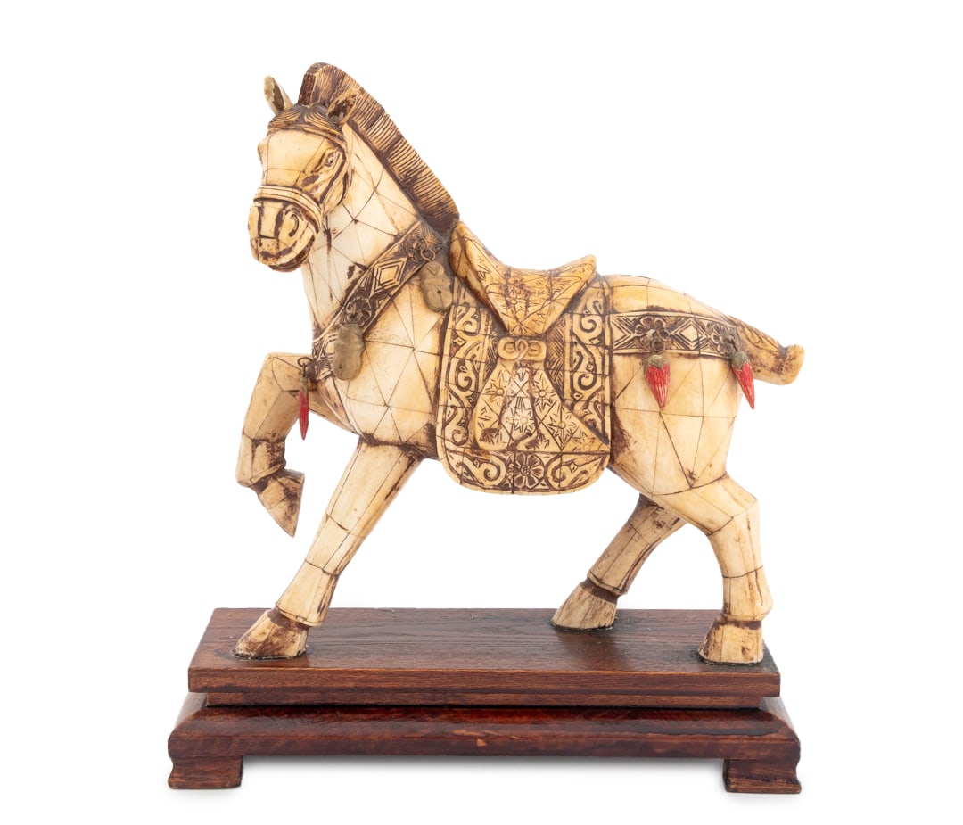 Chinese Tessellated Bone Horse Sculpture: Chinese Tessellated Bone Horse Sculpture, Tang Dynasty style, with painted ceramic decoration to saddle, on carved wood stand. Sculpture: 11.75" H x 11.5" W x 4.5" D; overall: 14.25" H x 12.75" W x 5.