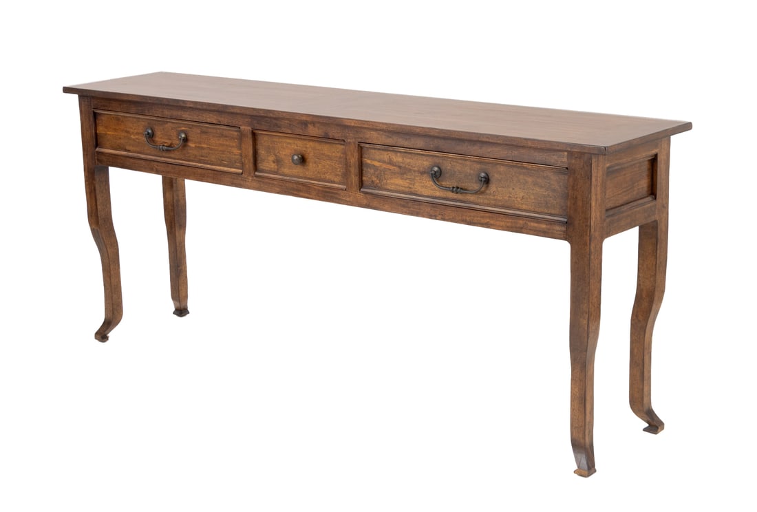 Baker Furniture Walnut Console Table: Baker Furniture Walnut Console Table, the rectangular top above central short drawer flanked by two frieze drawers on four cabriole legs, "Baker Furniture / The Milling Road Collection" label to the i