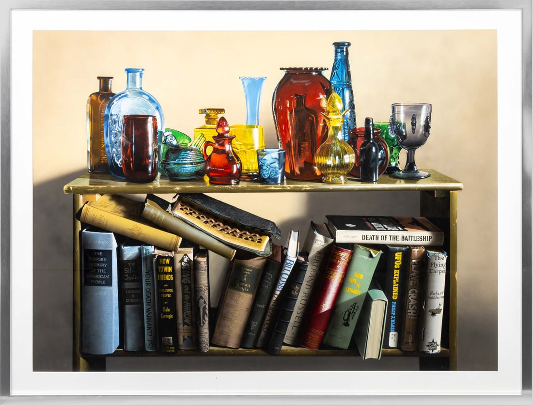Daniel K. Tennant Books Under Glass Gouache: Daniel K. Tennant (American, b. 1953), Books Under Glass Bottles Still Life Scene, Gouache on Museum Board, silver-tone frame. Image: 38.5" H x 52" W; frame: 46" H x 58" W. Provenance: From a Long Isl