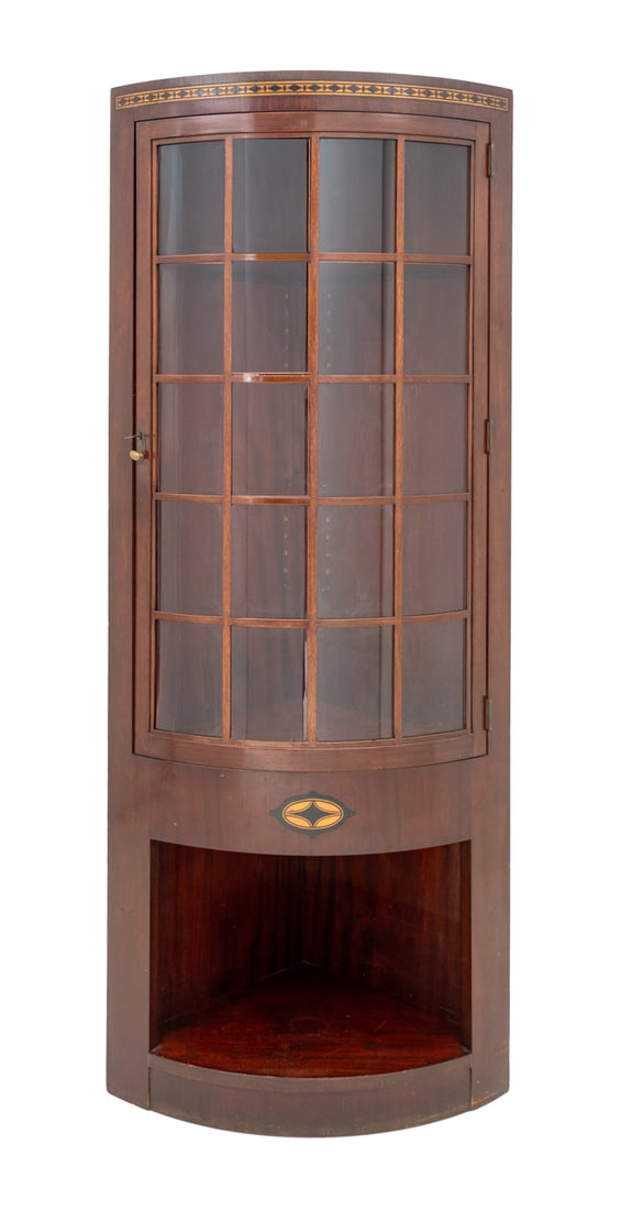 Marquetry Mahogany Corner Cabinet: Marquetry Mahogany Corner Cabinet, with signed glass paned door opening to shelving above an open compartment. 80" H x 33" W x 23" D. Provenance: From an Upper West Side, New York City Collection. Key