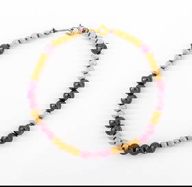 14K Yellow Gold Amethyst Bead Bracelet: 14K Yellow Gold and Amethyst Bead Bracelet, strung on silk cord, featuring round 14K gold beads, approx. 3.8 - 4.0 mm, further decorated with round amethyst beads, approx. 5.5 - 6.0 mm, joined with sp