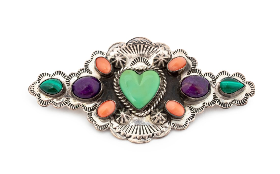 C. Aguilar Southwestern Sterling Silver Brooch: C. Aguilar Southwestern Sterling Silver Brooch, brightly polished, engraved and antiqued, featuring a bezel set turquoise heart, further adorned with bezel set coral, malachite and sugilite cabochons,