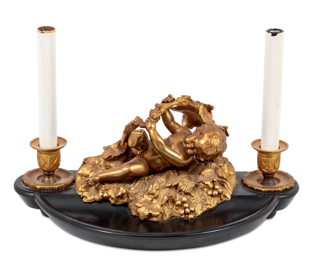 Charles Cumberworth Gilt Bronze Slate Pen Stand: Charles Cumberworth (French, 1811-1852) Gilt Bronze and Black Slate Pen Stand, late 19th century, the D-shaped pen tray mounted with central reclining cherub flanked by candlesticks, the central bronz